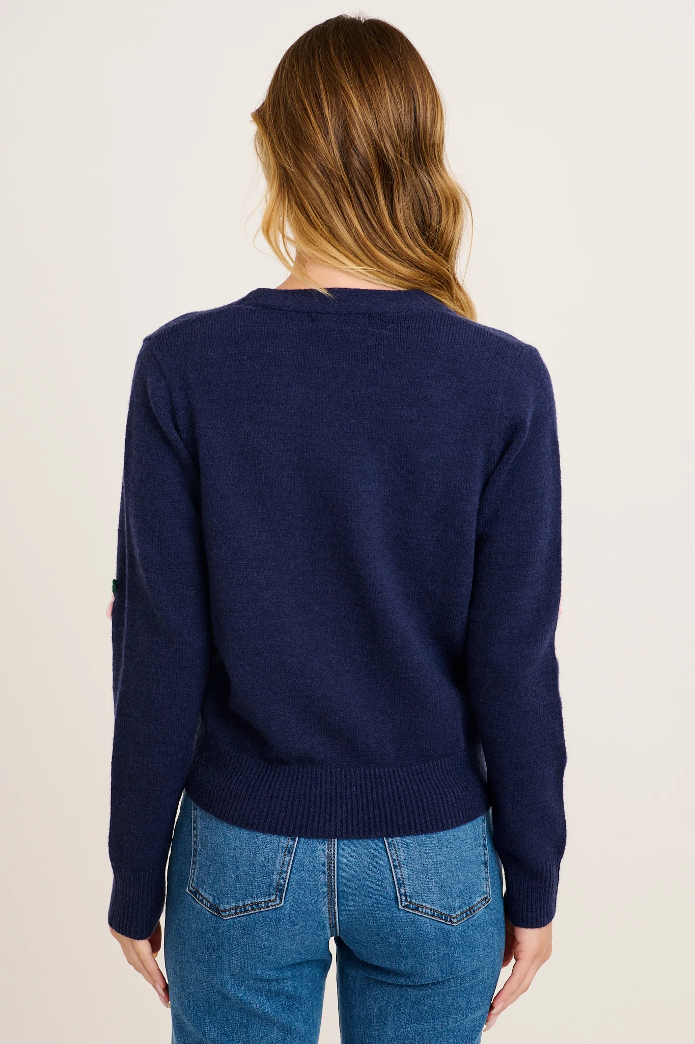 Fuzzy Feeling Knit Cardigan in Navy with Pink Flower - Image 3