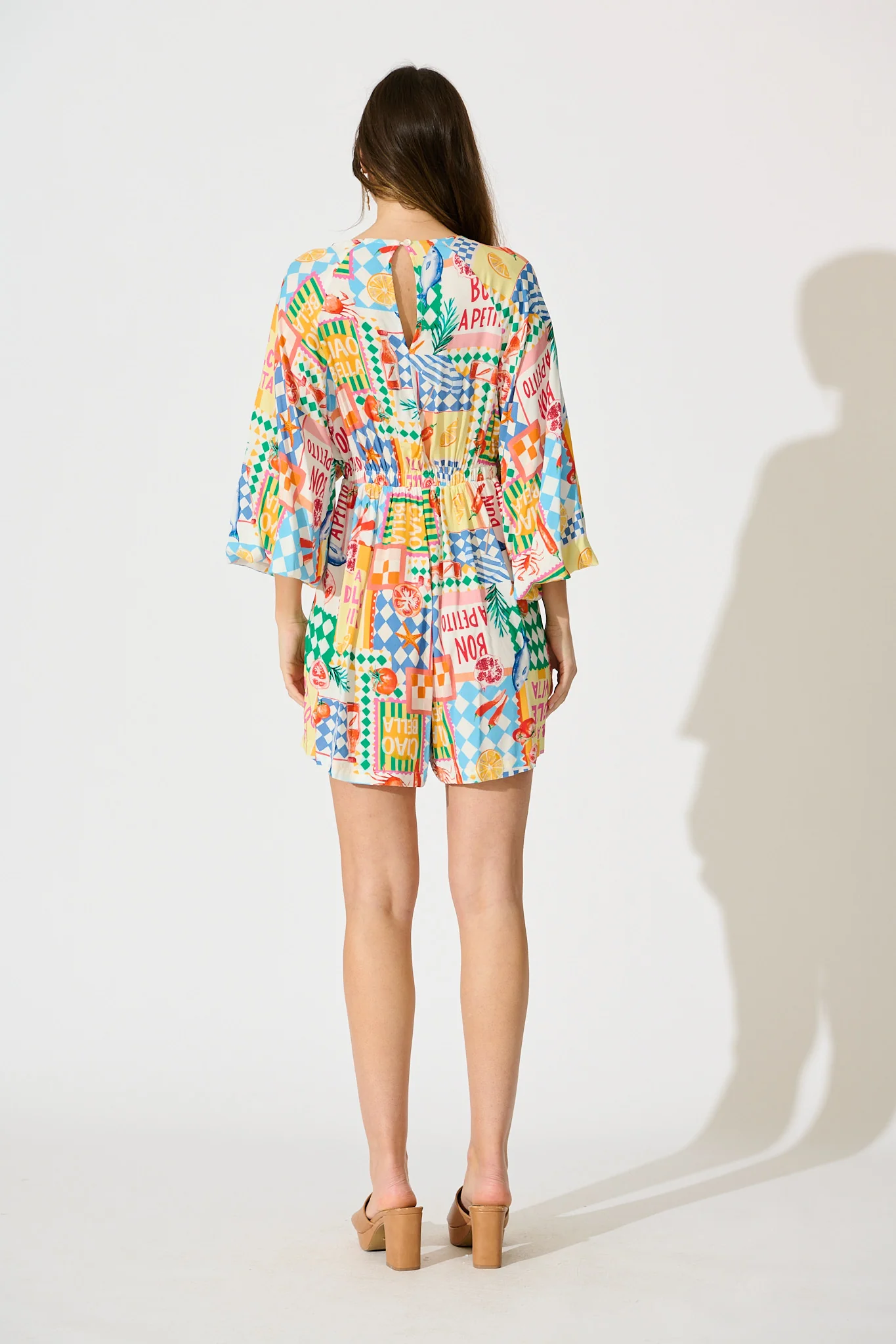 Otillie Playsuit in White Multi Conversational Print - Image 4