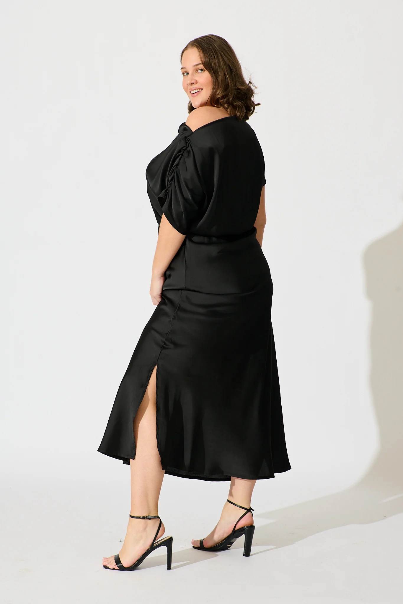 Sarita Maxi Off Shoulder Dress in Black Satin - Image 10